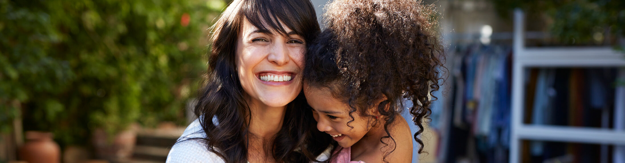 Mom and daughter laughing